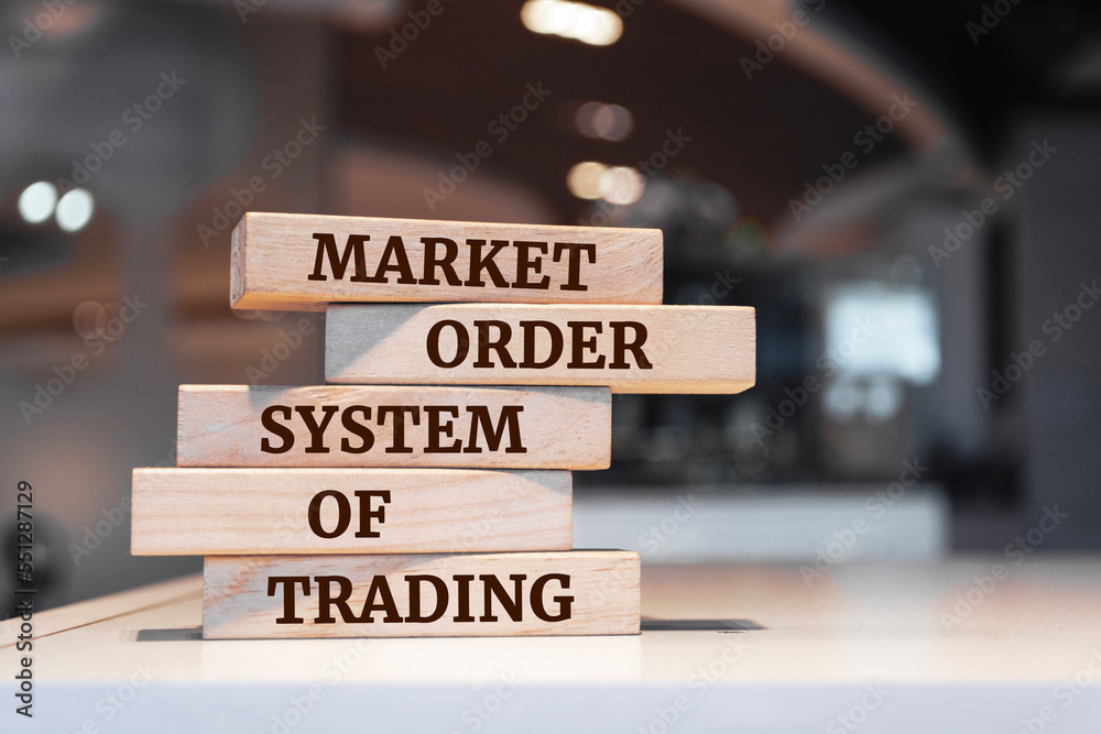 Wooden blocks with words 'Market Order System Of Trading'.