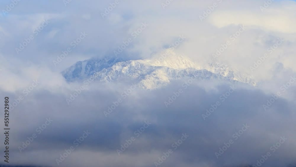 Bank of clouds from the snowy mountains of the northern Japanese alps Bank of clouds from the snowy mountains of the northern Japanese alps