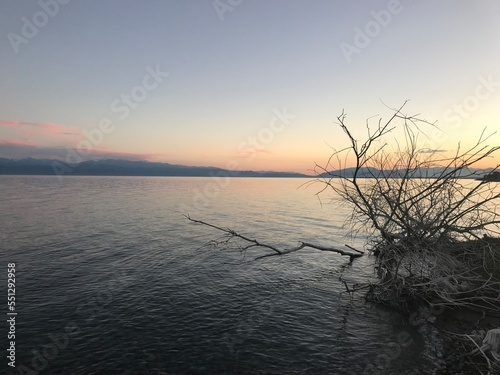 Sunset on the Issyk-kul lake in Kyrgyzstan photo