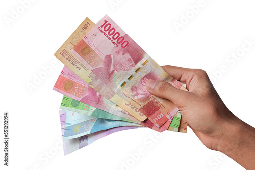 hand with rupiah banknotes photo