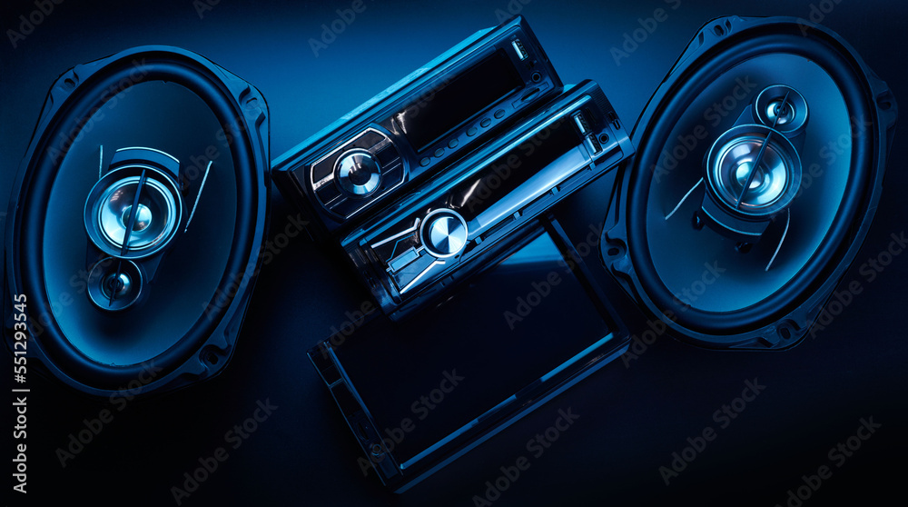Black car sound speakers and radio tape recorder close-up on black background, audio system, hard bass subwoofer, control panel - obrazy, fototapety, plakaty 