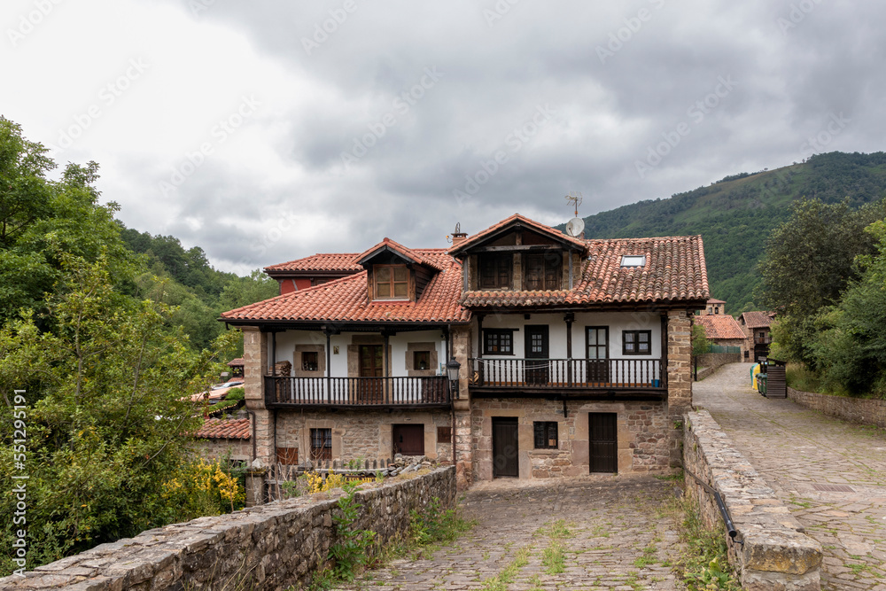 Stone houses and narrow streets in a mountain village in the north of Spain. barcena mayor