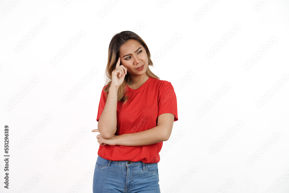 Studio shot of pretty Asian woman with red t-shirt isolated on white background. Thinking Studio shot of pretty Asian woman with red t-shirt isolated on white background. Thinking