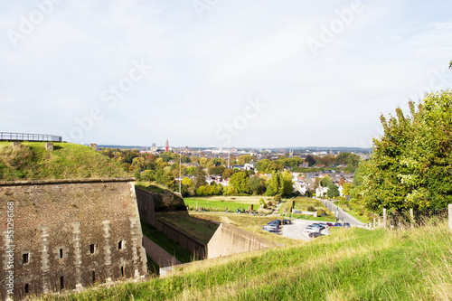 Fortress of Saint Pieter on a mountain with the sky line of Maastricht in the background