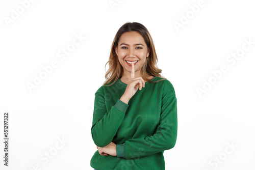Attractive beautiful asian woman in green sweater isolated on white background. Looking camera © NanSan