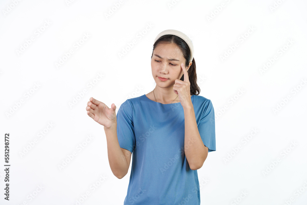 Beautiful Asian woman in blue t-shirt isolated on white background. Holding hands product Beautiful Asian woman in blue t-shirt isolated on white background. Holding hands product