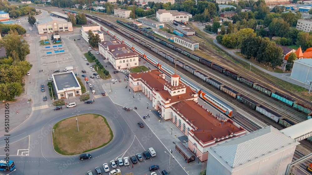 Yoshkar-Ola, Russia - September 24, 2022: Train Station. Panorama of the central part of the city from the air during sunset, Aerial View