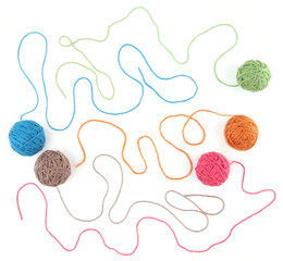 Colorful cotton thread balls isolated on white background. Set of five color (orange, pink, grey, green, blue) thread balls..