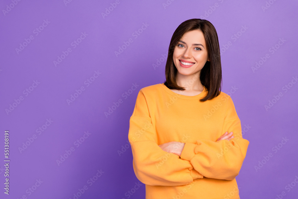 Close up photo of cute sweet lady wear orange sweater show bright toothy smile good mood empty space isolated on purple color background Close up photo of cute sweet lady wear orange sweater show bright toothy smile good mood empty space isolated on purple color background