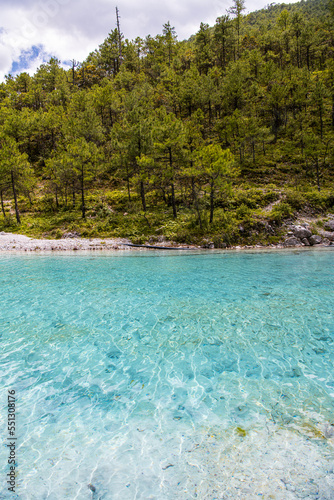 Turquoise waters of the Blue Moon Valley next to Jade Dragon Snow Mountain, Lijiang, Yunnan China.