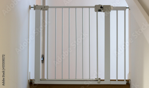 Child safety gate at home; childhood concepts