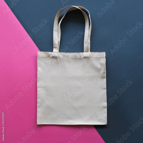 Fabric shopper bag mockup on a color block pink and gray background