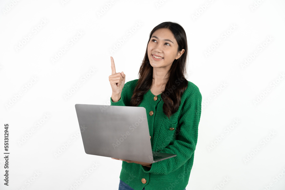 Smiling young woman student holding laptop computer and looking at camera on isolated white background. Pretty lady model with black hair emotionally showing facial expressions in studio. Smiling young woman student holding laptop computer and looking at camera on isolated white background. Pretty lady model with black hair emotionally showing facial expressions in studio.