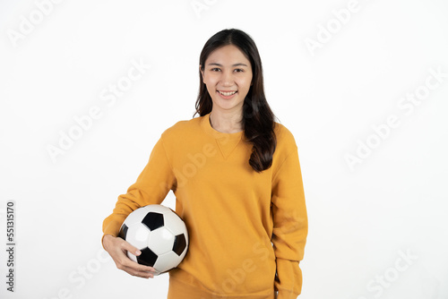 Excited young asian woman shout cheering football players. Entertainment and hobby concept. © Parichat