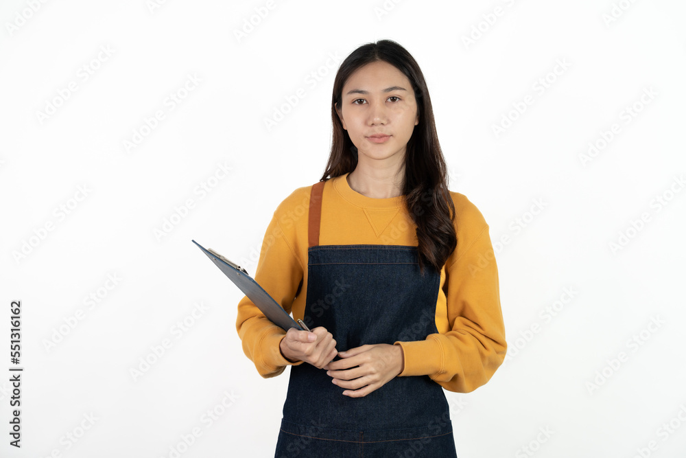 Happy young asian woman business owner wear apron and holding digital tablet for checking order from customer isolated on white background for SME franchise investment concept. Happy young asian woman business owner wear apron and holding digital tablet for checking order from customer isolated on white background for SME franchise investment concept.