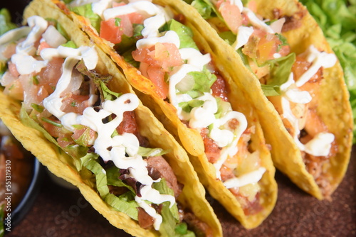 mexican tacos with guacamole jalapeno pepper salad typical tex mex cuisine photo