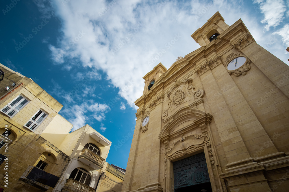 Exterior of saint George cathedral or church in the city of Victoria on island of Gozo, Malta, on a sunny day.