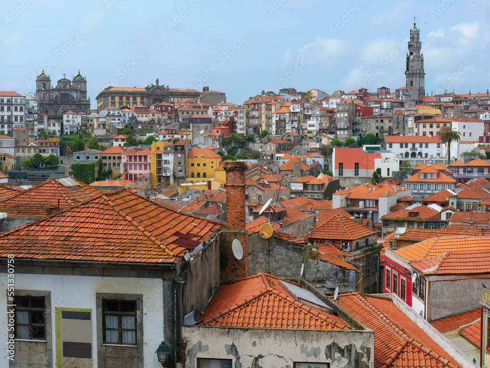 High angle view of Porto Oldtown, Red and Orange color tiled roofs and colorful old houses, view from above. Town scape of World Heritage site, Porto Portugal