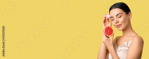 Beautiful woman with grapef...