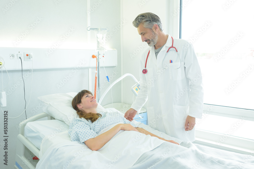Fototapeta premium doctor visiting the recovering patient