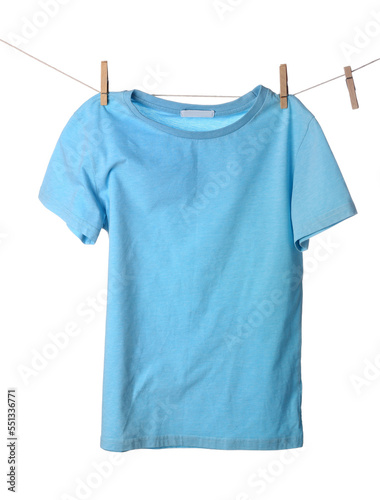 Blue t-shirt hanging on rope against white background