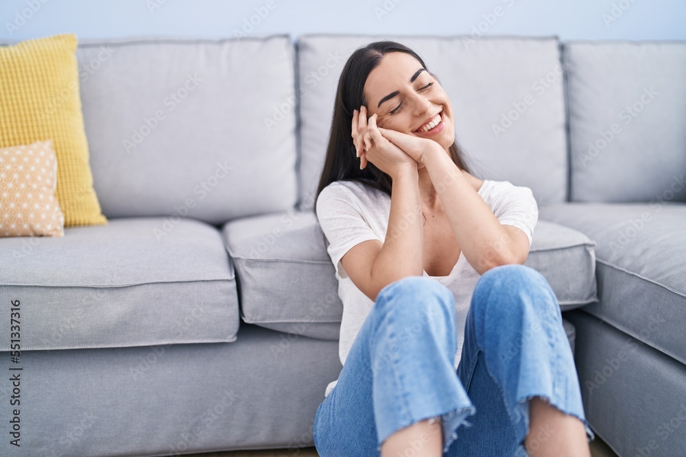 Young hispanic woman smiling confident sitting on floor at home Young hispanic woman smiling confident sitting on floor at home