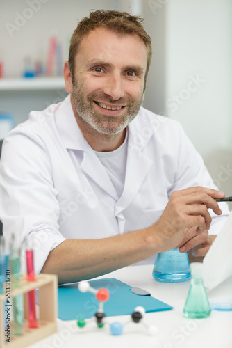 smiling lab technician giving thumbs up