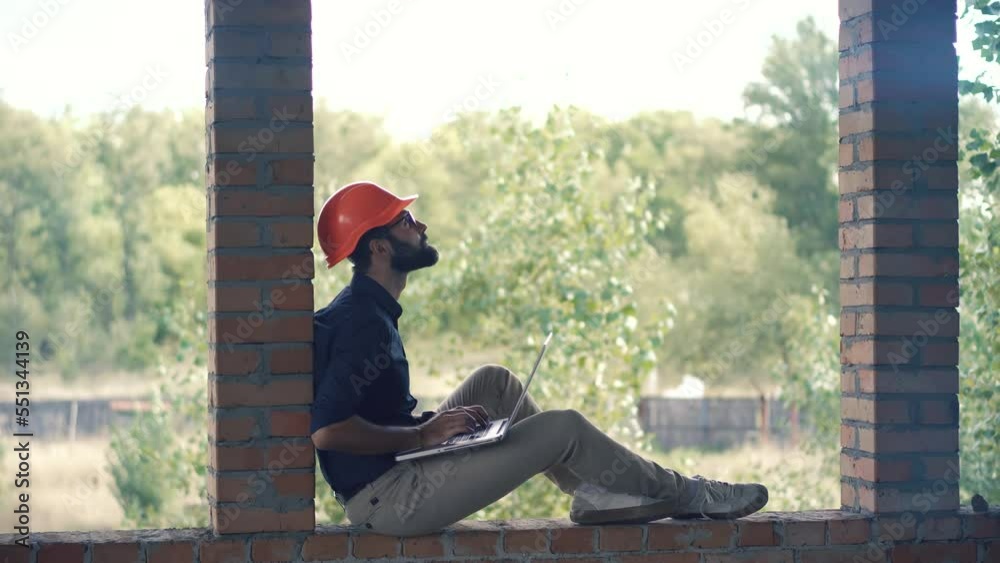 engineer builder check blueprints on building site. architect developer