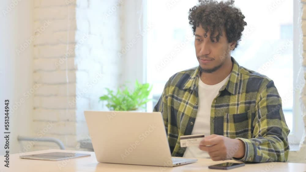 Young African Man with Online Payment Failure on Laptop Young African Man with Online Payment Failure on Laptop