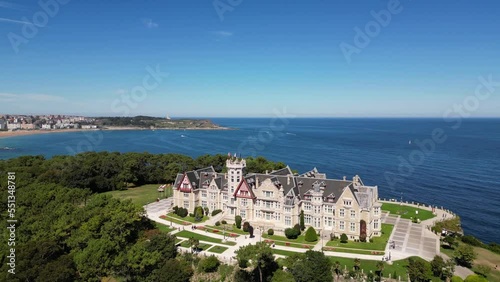 Magdalena Palace in Santander Spain with aerial view of the peninsula and the city with sunny beach in summer.	
 photo