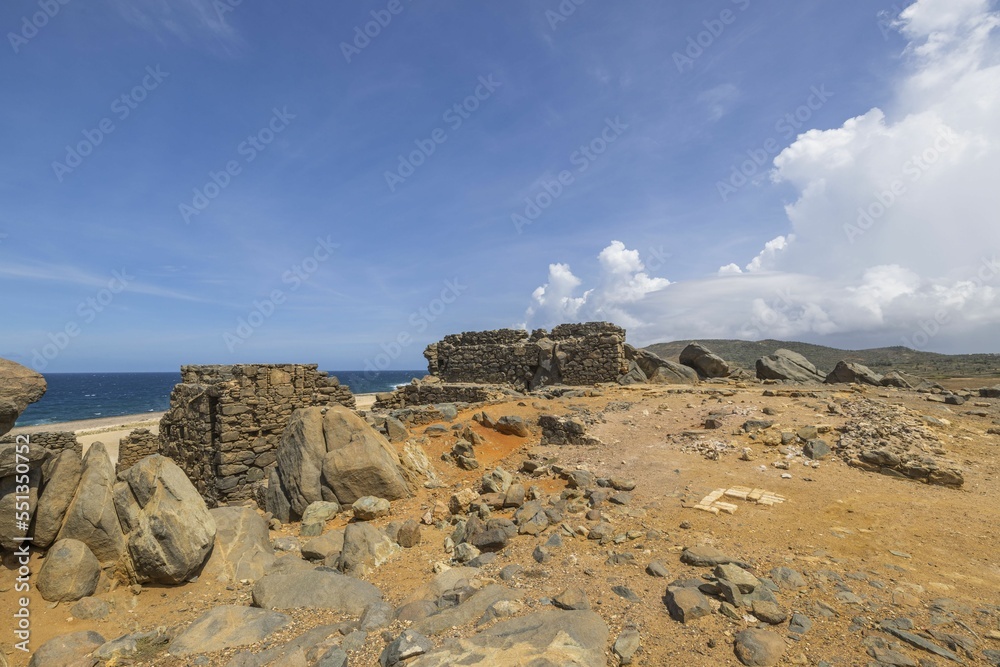 Beautiful view of rocky coast with ruins of Bushiribana to north of island of Aruba. Beautiful view of rocky coast with ruins of Bushiribana to north of island of Aruba.