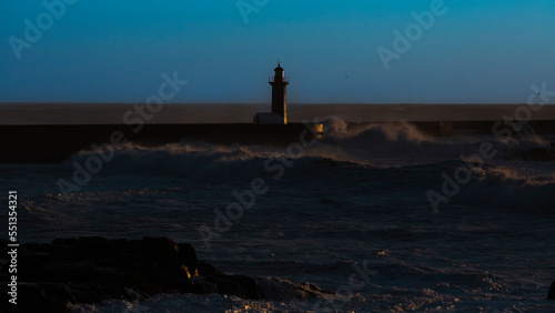 The Atlantic Lighthouse at dusk. Porto  Portugal.
