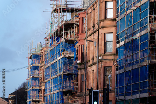 Scaffolding surrounding house development for safe access to construction work