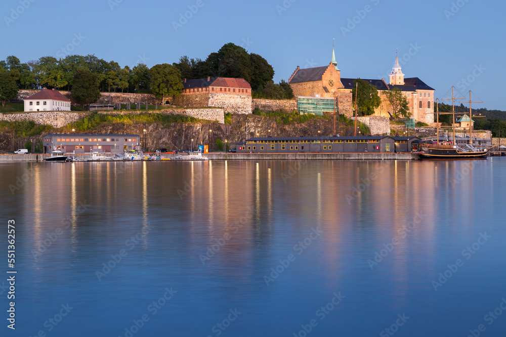 Iluminated Akershus Fortress in Oslo during the blue hour