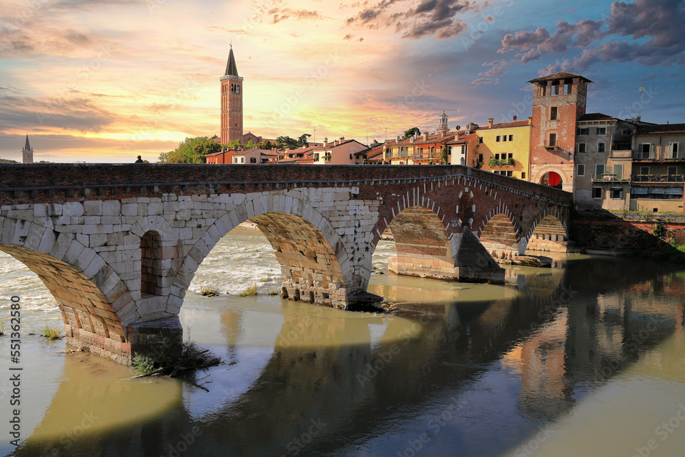 The roman Stone Wall Bridge (Ponte Pietra) over the Adige River. Verona, Italy, Europe.
