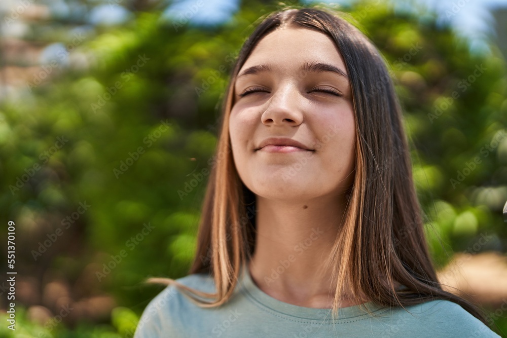 Adorable girl smiling confident breathing at park Adorable girl smiling confident breathing at park