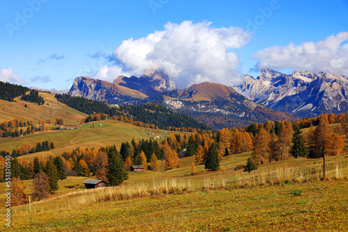 Iconic view of Seiser Alm (Alpe di Siusi) with Sassolungo and Sassopiatto mountains, South Tyrol, Italy, Europe