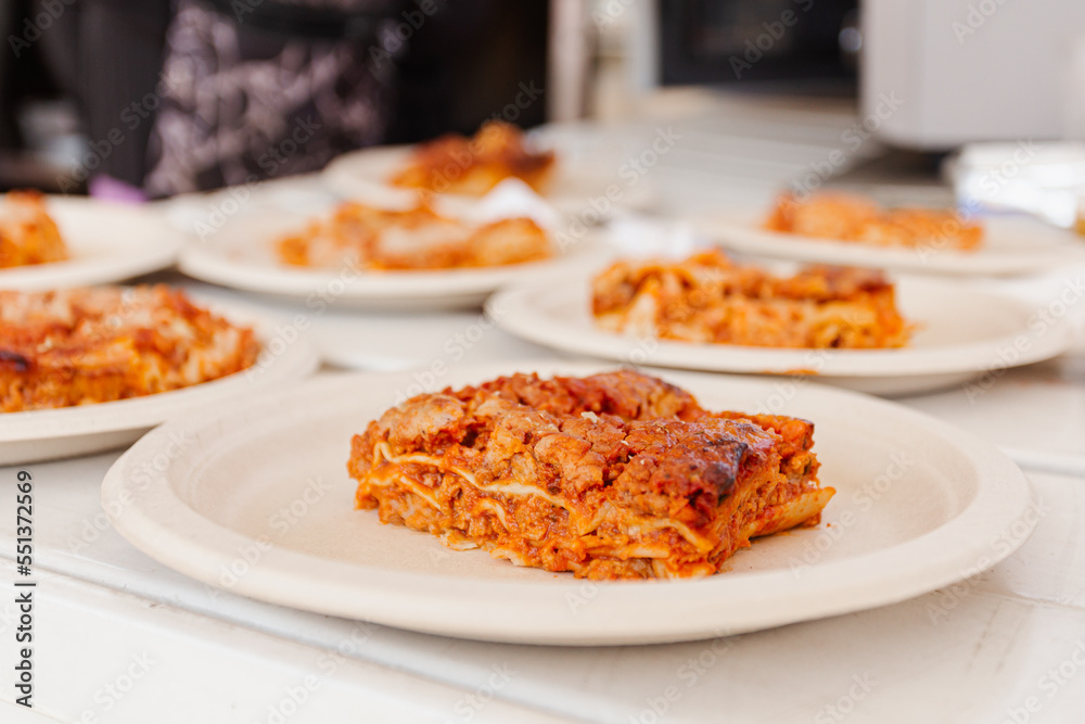 Vegan lasagna. Typical Italian lasagna with vegan meat sauce, tomato and vegan cheese-1 Vegan lasagna. Typical Italian lasagna with vegan meat sauce, tomato and vegan cheese-1