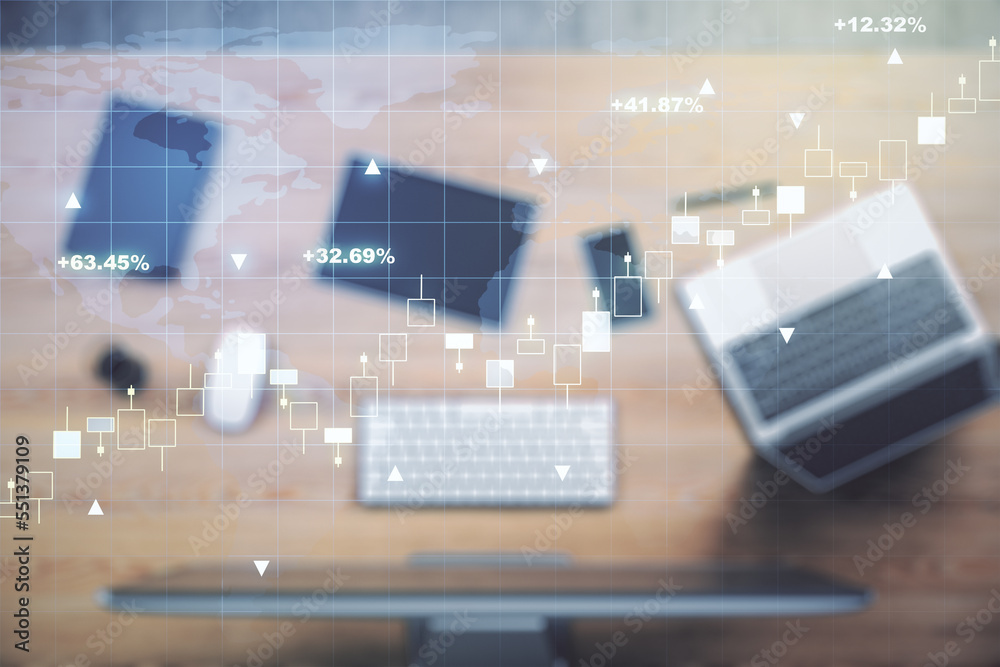 Multi exposure of abstract creative financial graph with world map on modern laptop background, forex and investment concept Multi exposure of abstract creative financial graph with world map on modern laptop background, forex and investment concept