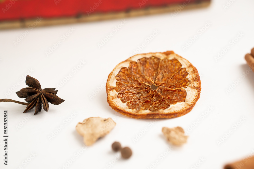 a set of spices for a warming drink in winter. ingredients for winter hot drinks(tea, mulled wine, punch). a set of spices for a warming drink in winter. ingredients for winter hot drinks(tea, mulled wine, punch).
