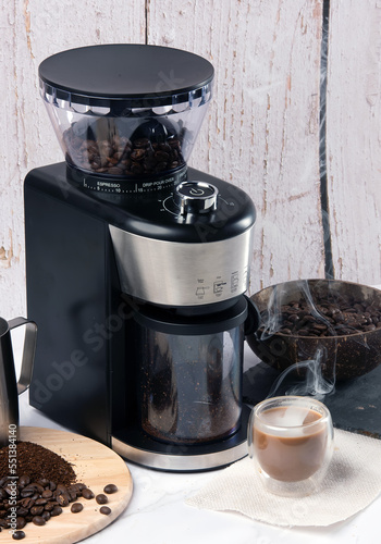 electric coffee grinder on non isolated background 