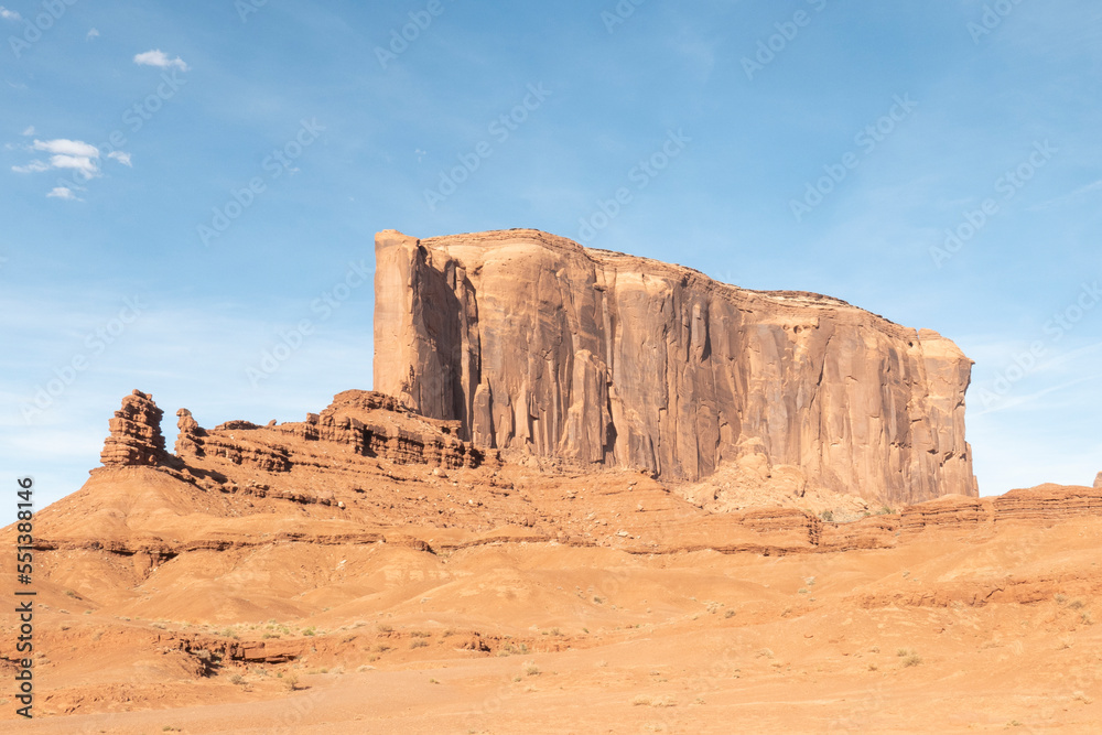 scenic view to monument valley with camel butte and blue sky
