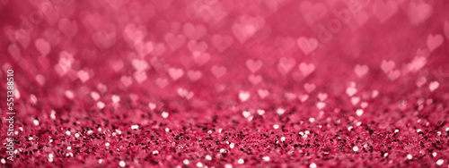 Valentines day web banner or red Viva Magenta color sparkle background with glitter.