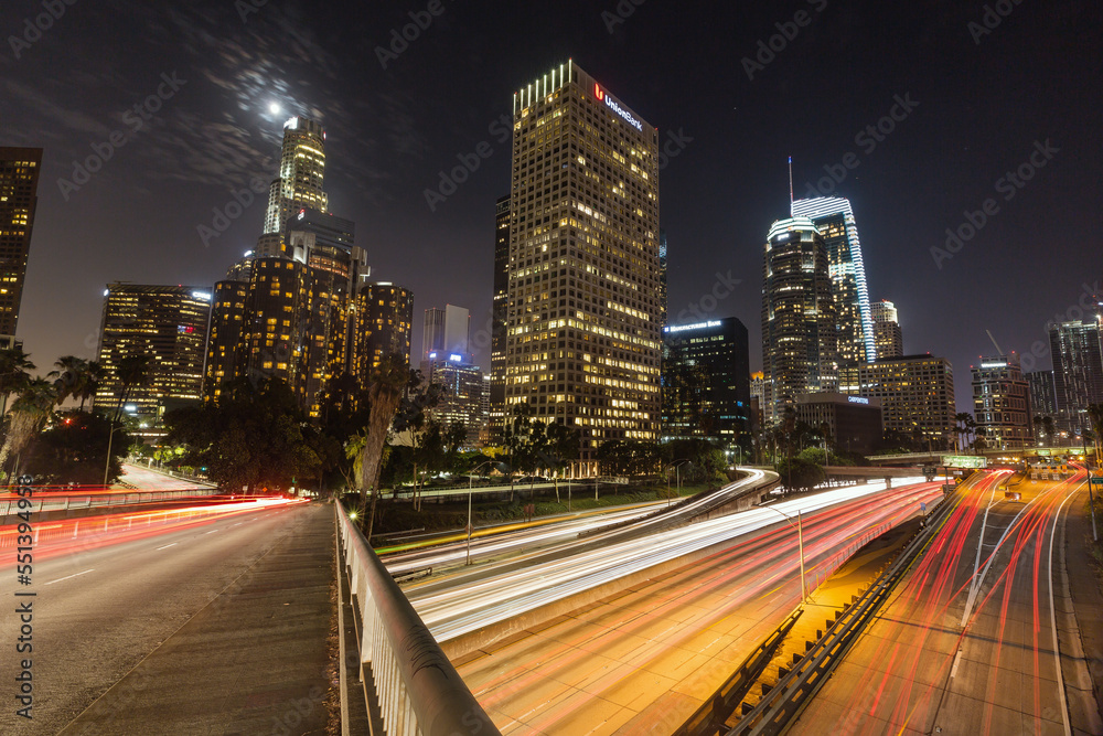 Fototapeta premium Highway through Los Angeles Downtown at Night