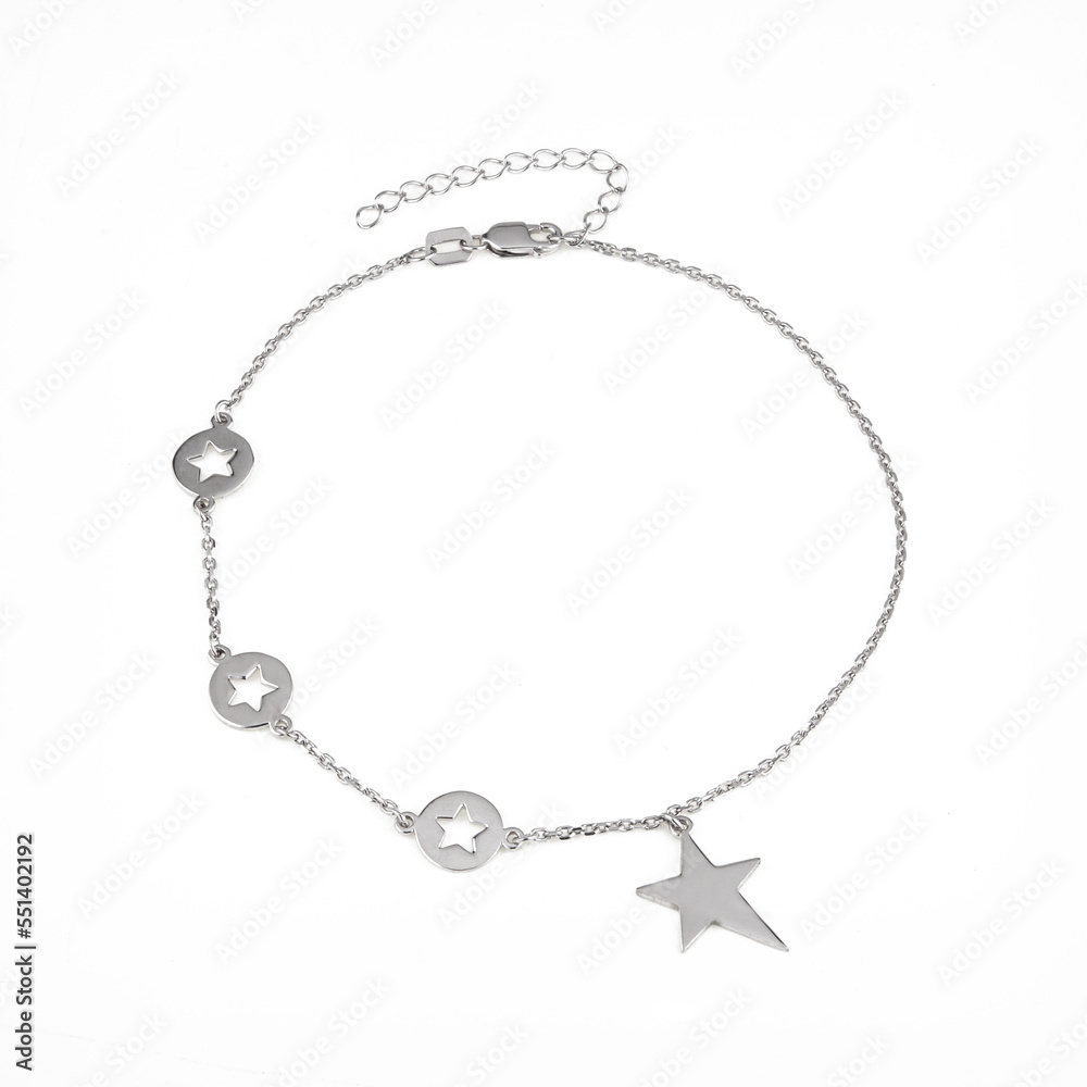 Elegant silver chain-bracelet with a pendants on a white background Elegant silver chain-bracelet with a pendants on a white background