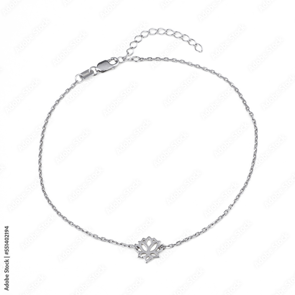 Elegant silver chain-bracelet with a pendants on a white background Elegant silver chain-bracelet with a pendants on a white background