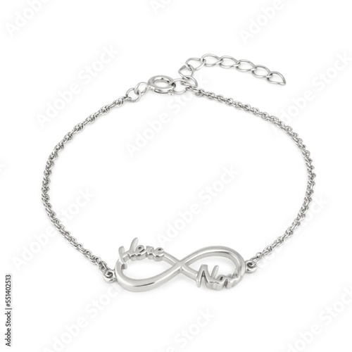 Elegant silver chain-bracelet with apendant in the form of the sign of infinity on a white background