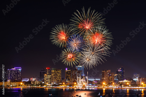 Abstract colored firework background light up the sky with dazzling display © meen_na