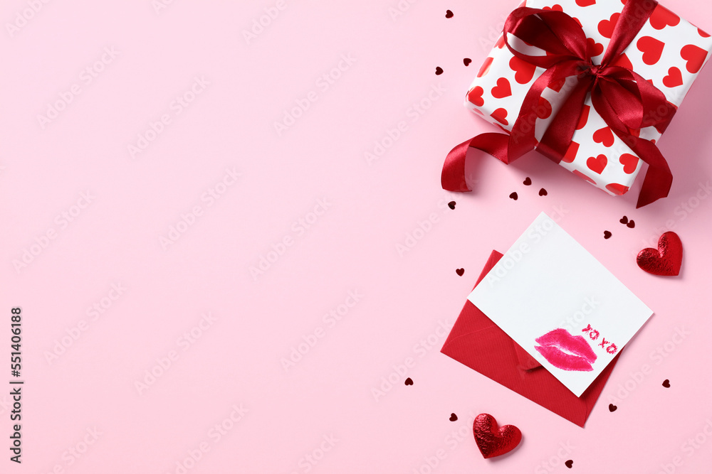 Valentine card with red envelope and gift box on pastel pink background. Happy Valentines day greeting card template. Valentine card with red envelope and gift box on pastel pink background. Happy Valentines day greeting card template.