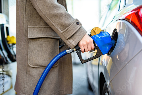 Korean Man Gasing at a Gas Station